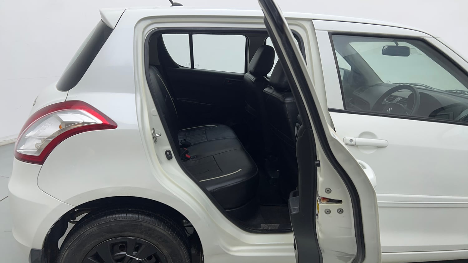Used 2014 Maruti Suzuki Swift LXi Petrol Manual interior RIGHT SIDE REAR DOOR CABIN VIEW