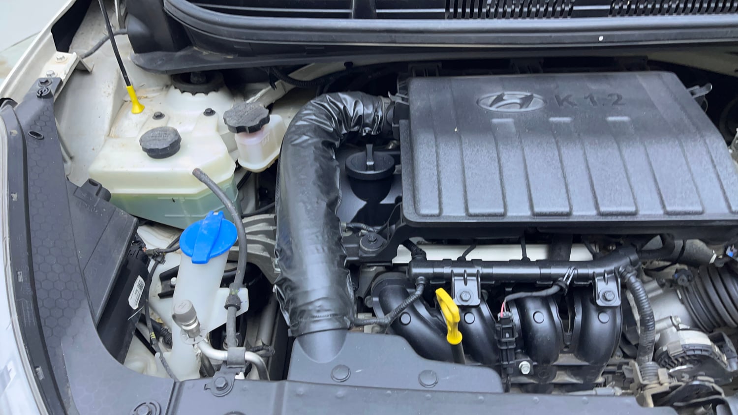 Used 2021 Hyundai Aura SX Plus 1.2 AMT Petrol Petrol Automatic engine ENGINE RIGHT SIDE VIEW