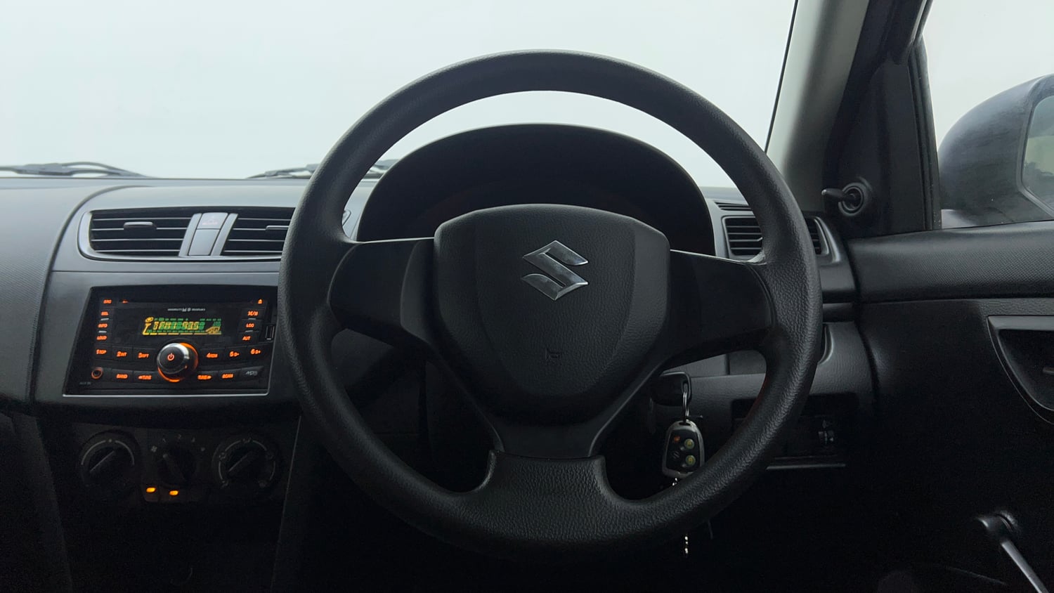 Used 2014 Maruti Suzuki Swift LXi Petrol Manual interior STEERING VIEW