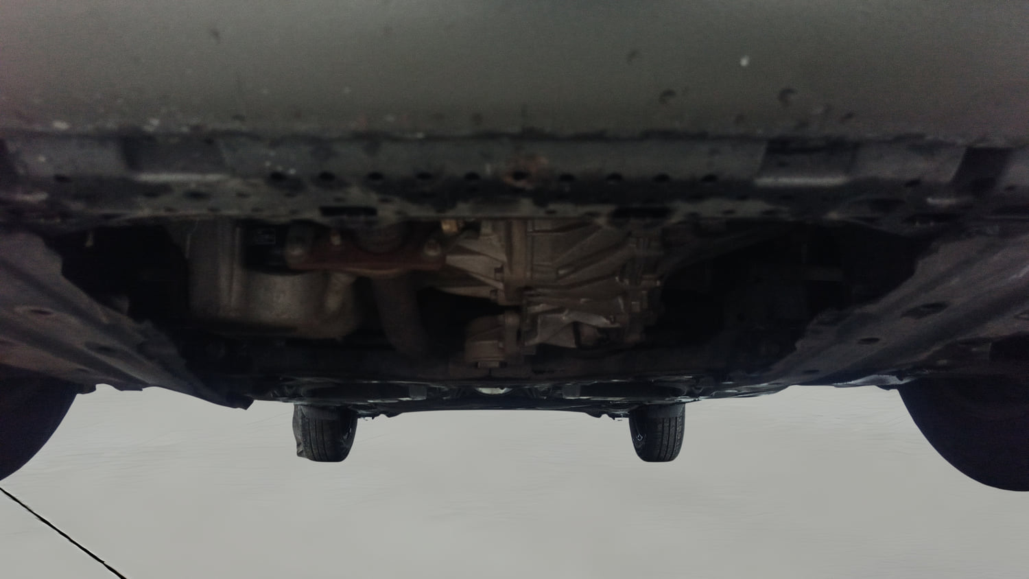 Used 2022 Maruti Suzuki Swift VXi AMT Petrol Automatic extra FRONT LEFT UNDERBODY VIEW