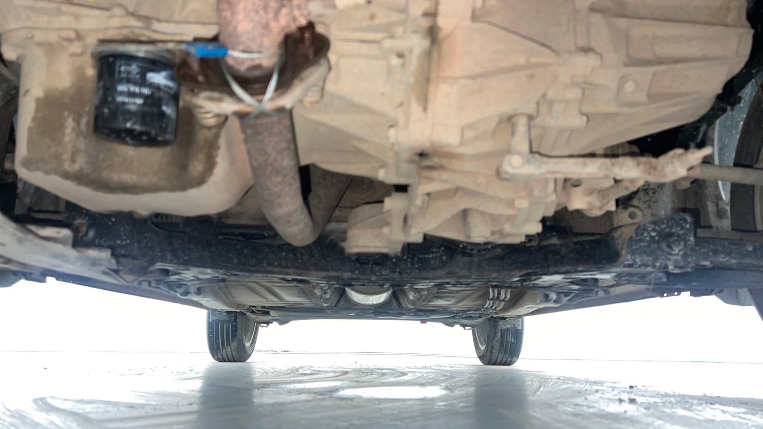 Used 2022 Maruti Suzuki Baleno Zeta Petrol Manual extra FRONT LEFT UNDERBODY VIEW
