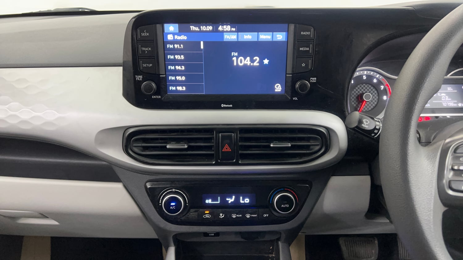 Used 2021 Hyundai Grand i10 Nios Sportz AMT 1.2 Kappa VTVT Petrol Automatic interior MUSIC SYSTEM & AC CONTROL VIEW