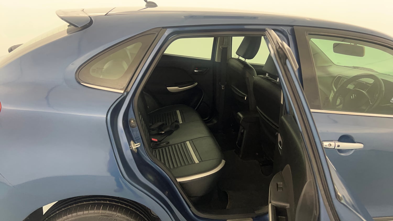 Used 2017 Maruti Suzuki Baleno Zeta 1.3 Diesel Manual interior RIGHT SIDE REAR DOOR CABIN VIEW