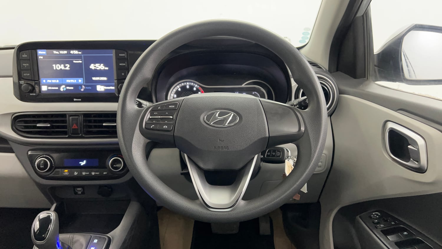 Used 2021 Hyundai Grand i10 Nios Sportz AMT 1.2 Kappa VTVT Petrol Automatic interior STEERING VIEW
