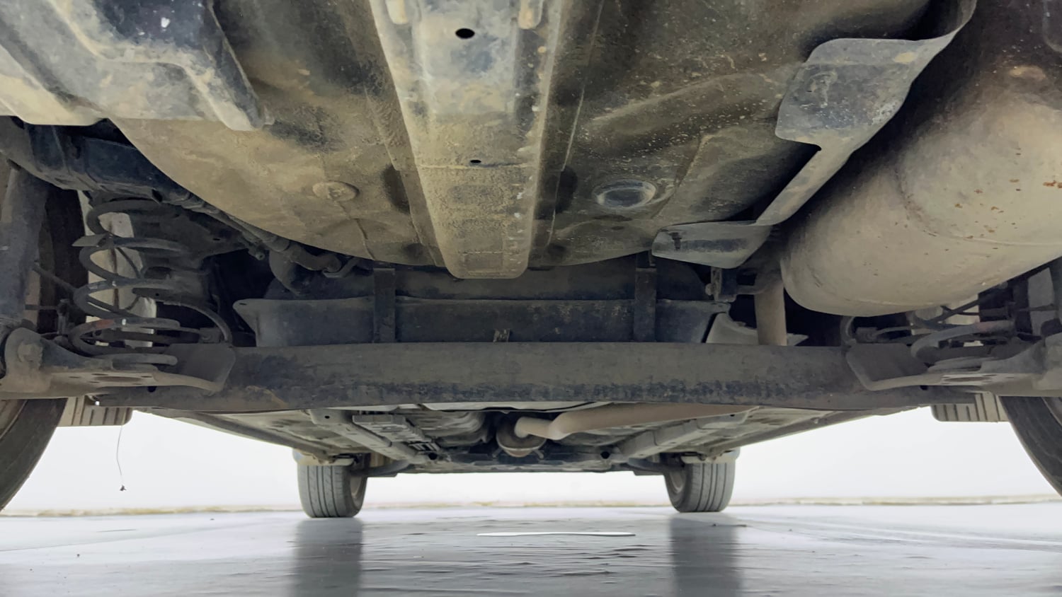 Used 2021 Hyundai Aura SX Plus 1.2 AMT Petrol Petrol Automatic extra REAR UNDERBODY VIEW (TAKEN FROM REAR)