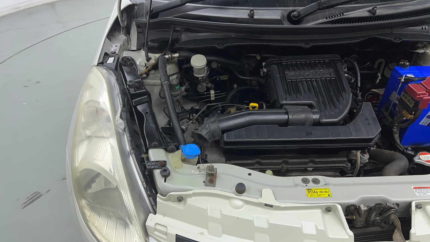 Used 2014 Maruti Suzuki Swift LXi Petrol Manual engine ENGINE RIGHT SIDE VIEW