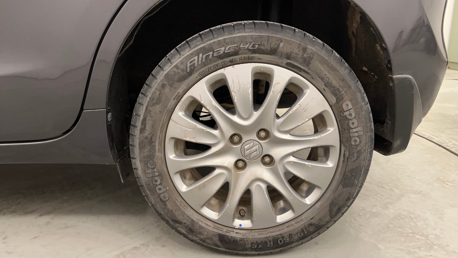 Used 2017 Maruti Suzuki Baleno Zeta 1.2 Petrol Manual tyres LEFT REAR TYRE RIM VIEW