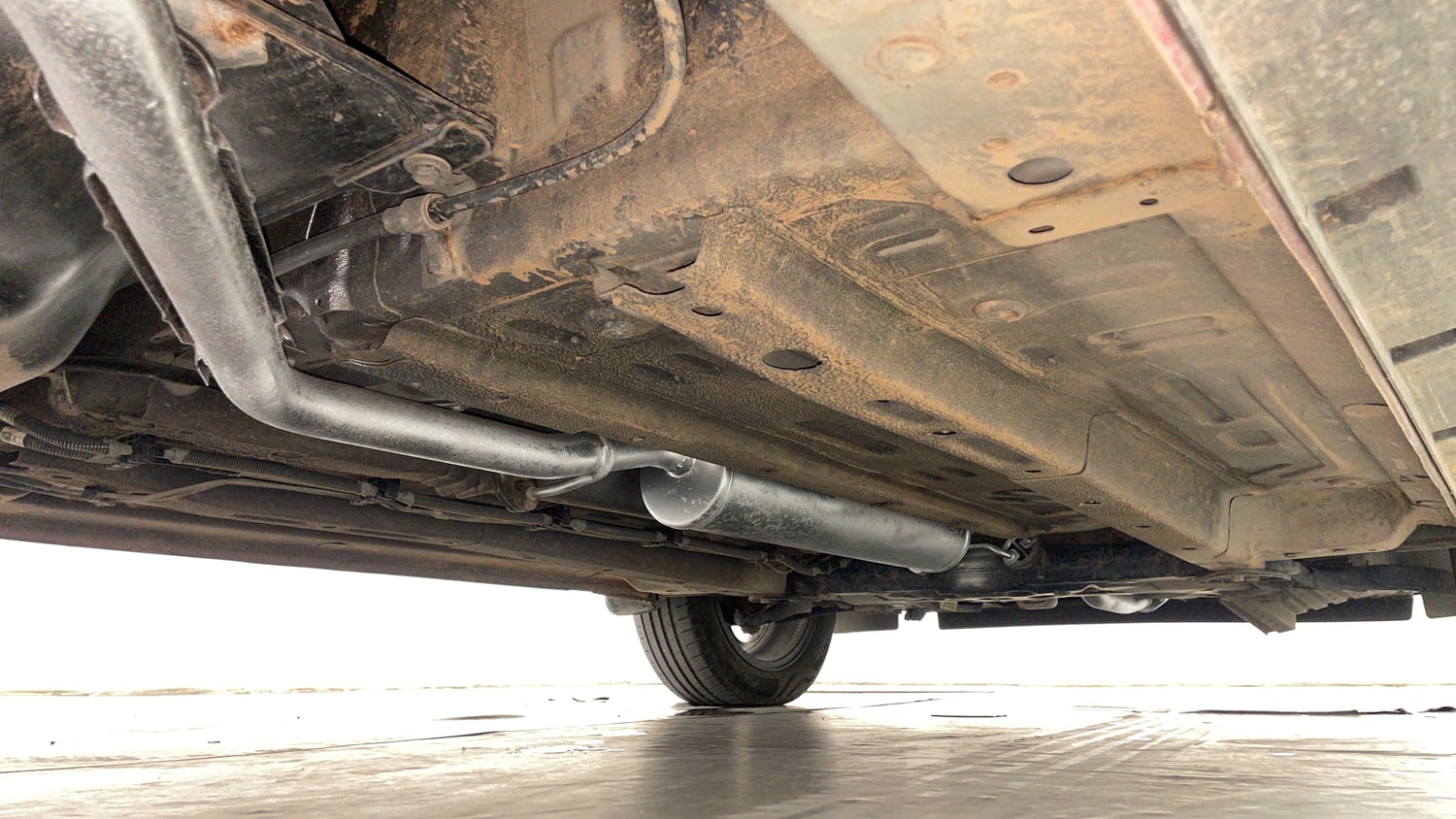 Used 2023 Tata Punch Creative Dual Tone AMT Sunroof Petrol Automatic extra REAR RIGHT UNDERBODY VIEW