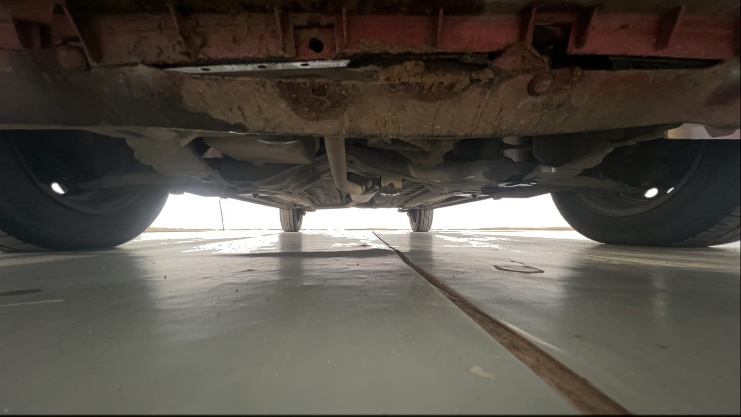 Used 2017 Maruti Suzuki Celerio VXi AMT Petrol Automatic extra FRONT LEFT UNDERBODY VIEW