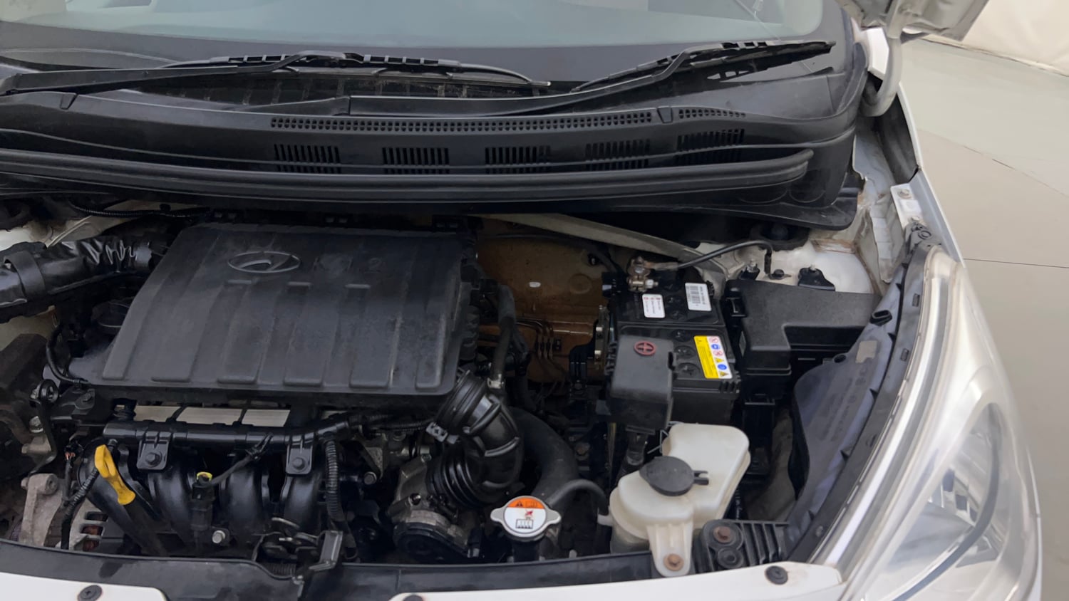 Used 2016 Hyundai Grand i10 Sportz 1.2 Kappa VTVT Petrol Manual engine ENGINE LEFT SIDE HINGE & APRON VIEW