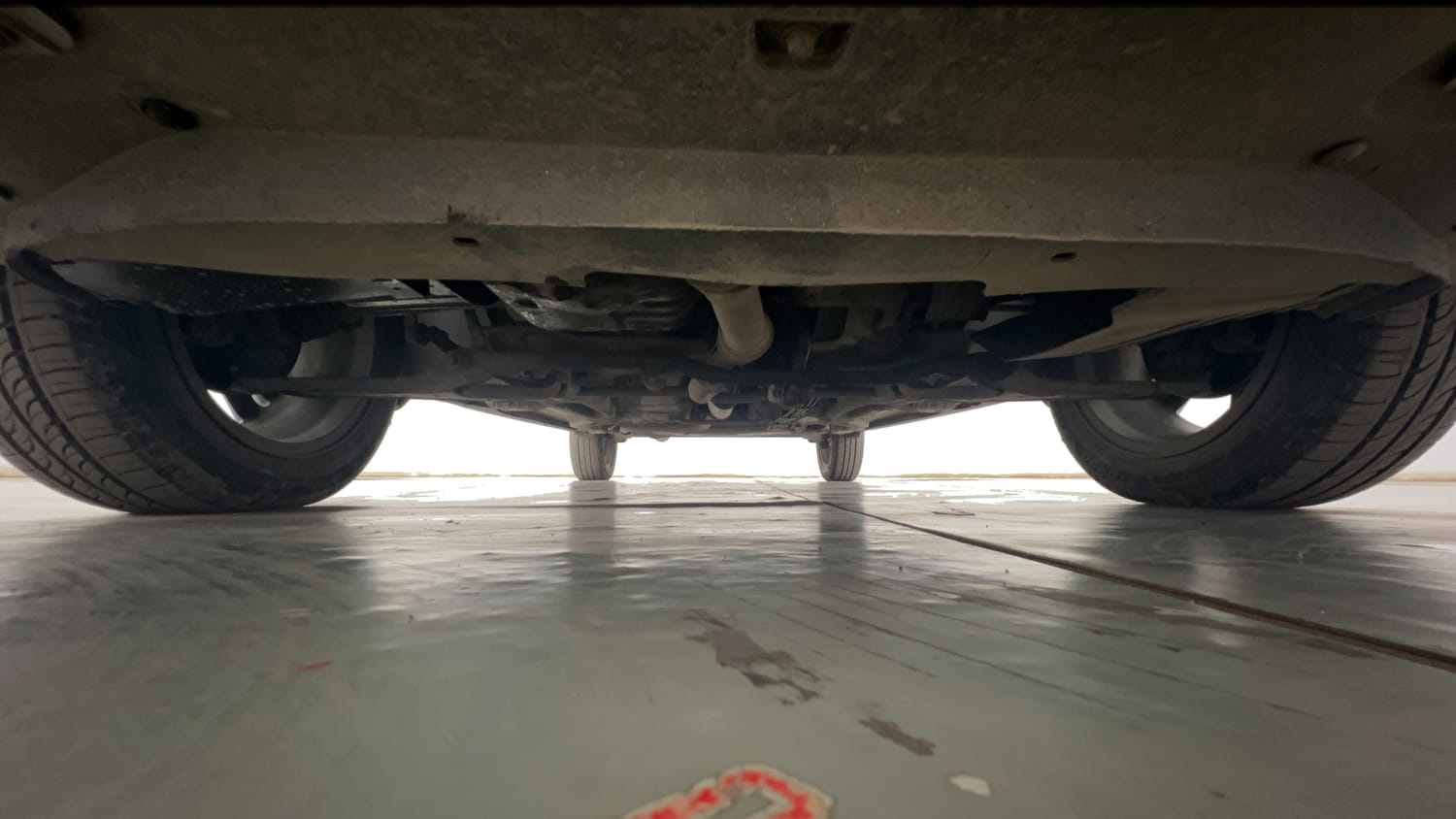 Used 2018 Tata Tigor Revotron XZA Petrol Automatic extra FRONT LEFT UNDERBODY VIEW