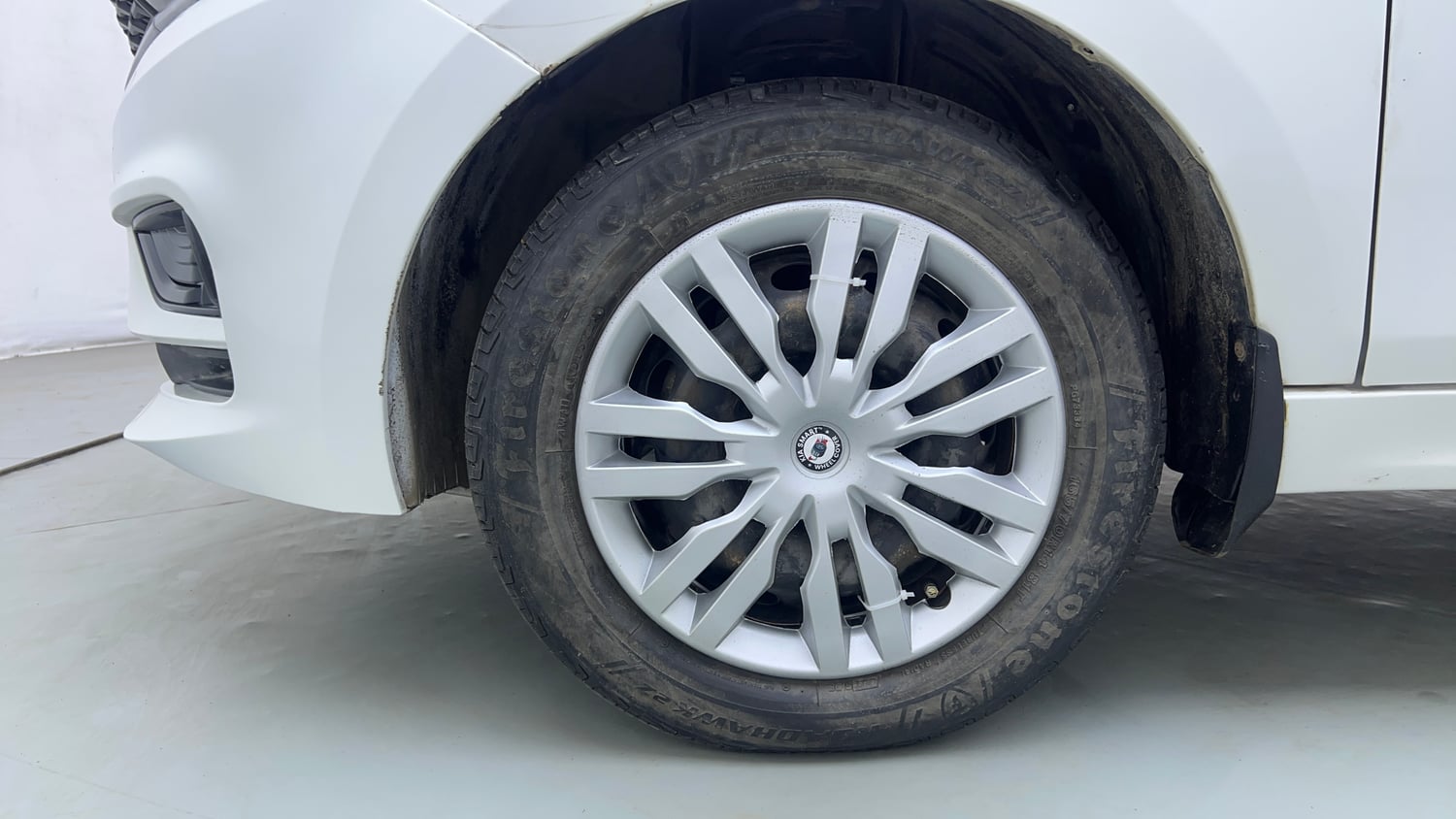 Used 2021 Tata Tiago XT Petrol Manual tyres LEFT FRONT TYRE RIM VIEW