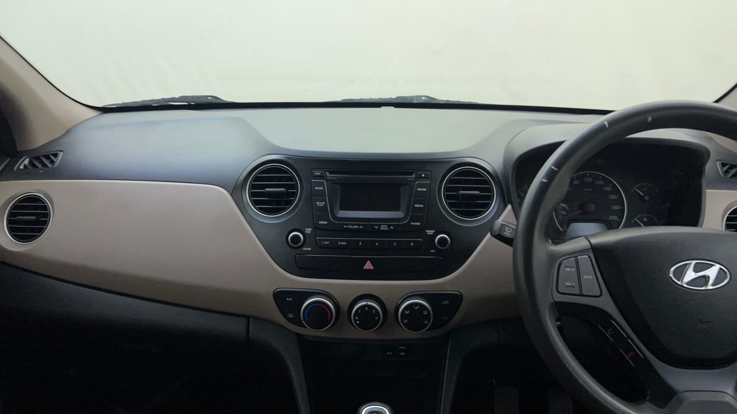 Used 2016 Hyundai Grand i10 Sportz 1.2 Kappa VTVT Petrol Manual interior MUSIC SYSTEM & AC CONTROL VIEW