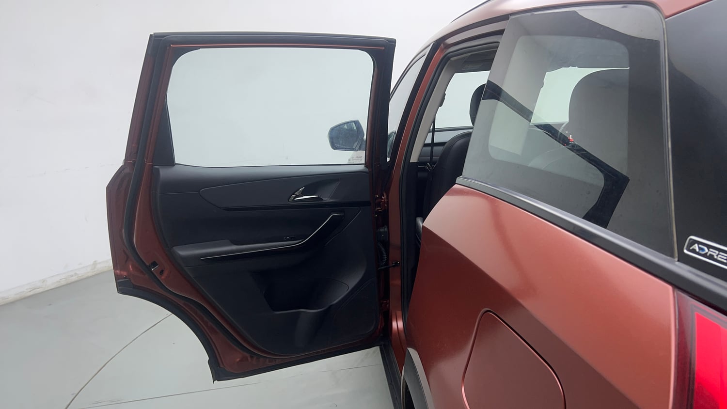 Used 2024 Mahindra XUV700 AX7 Luxury Pack Petrol 7 STR Blaze Editon AT Petrol Automatic interior LEFT REAR DOOR OPEN VIEW