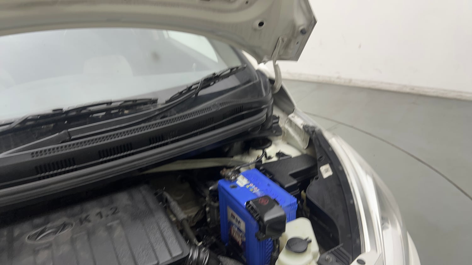 Used 2015 Hyundai Grand i10 Sportz 1.2 Kappa VTVT Petrol Manual engine ENGINE LEFT SIDE HINGE & APRON VIEW