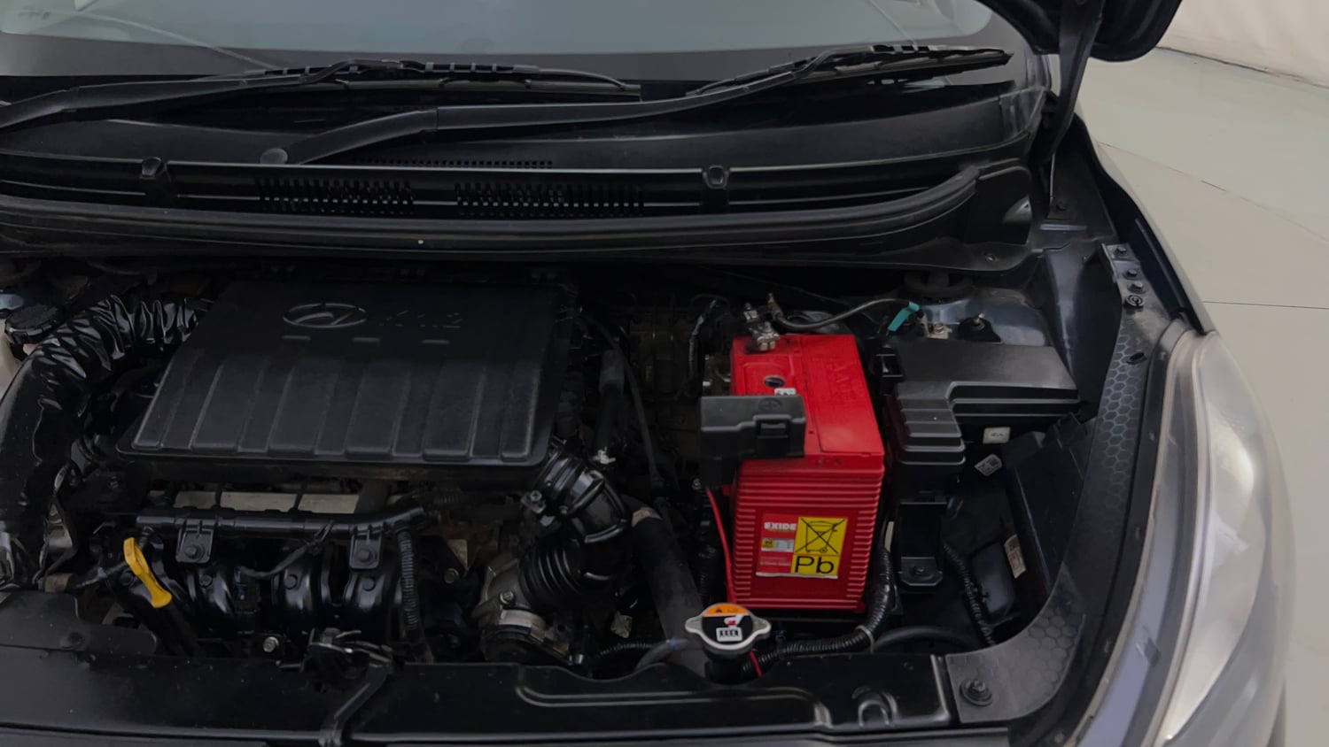 Used 2021 Hyundai Grand i10 Nios Sportz 1.2 Kappa VTVT Petrol Manual engine ENGINE LEFT SIDE HINGE & APRON VIEW