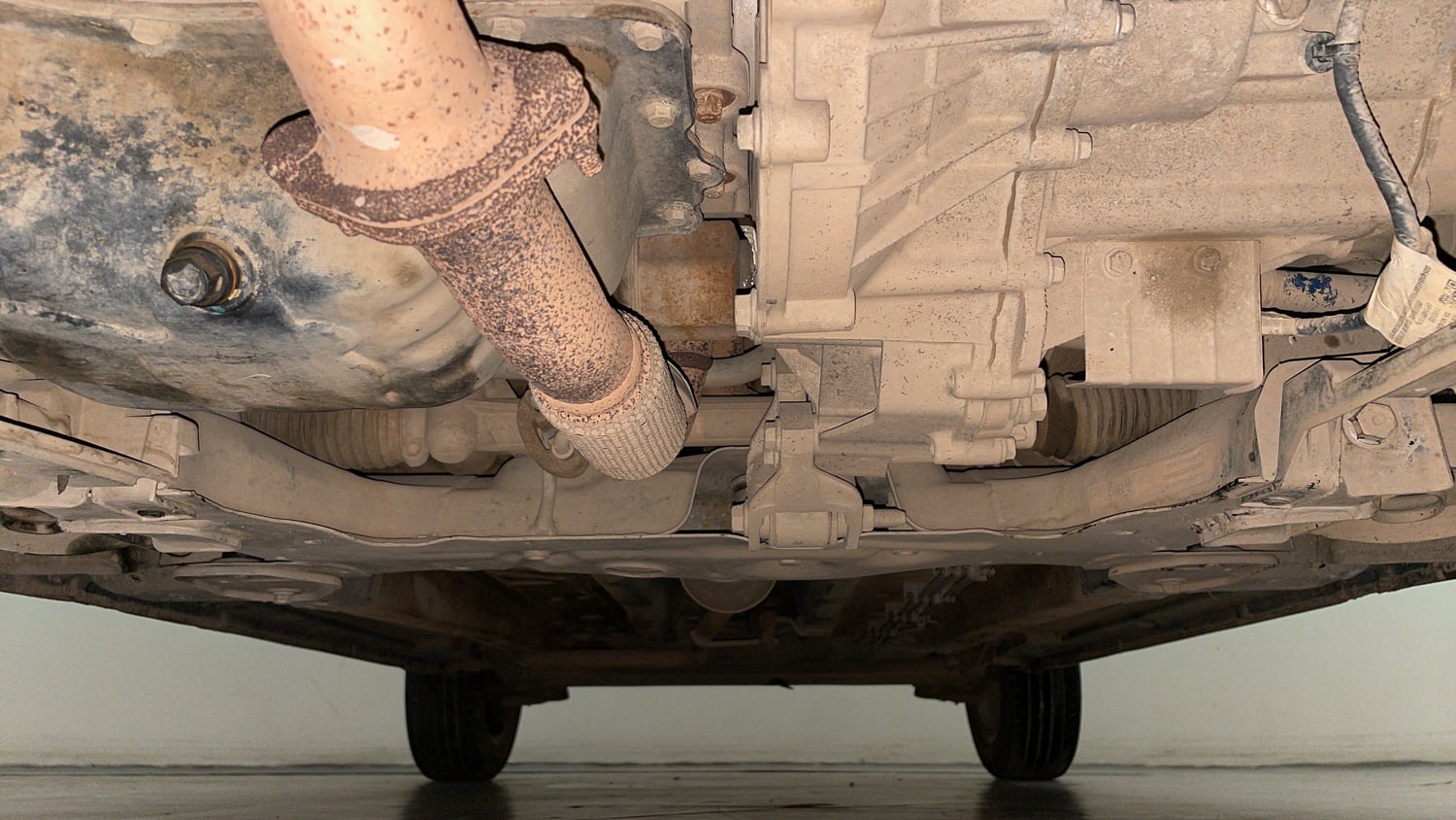 Used 2022 Tata Punch Kaziranga Creative AMT Petrol Automatic extra FRONT LEFT UNDERBODY VIEW