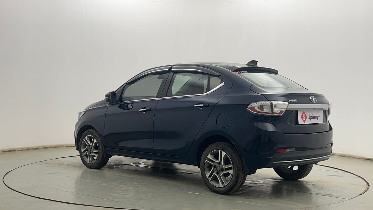 Used 2022 Tata Tigor XZ Plus Petrol Manual exterior LEFT REAR CORNER VIEW