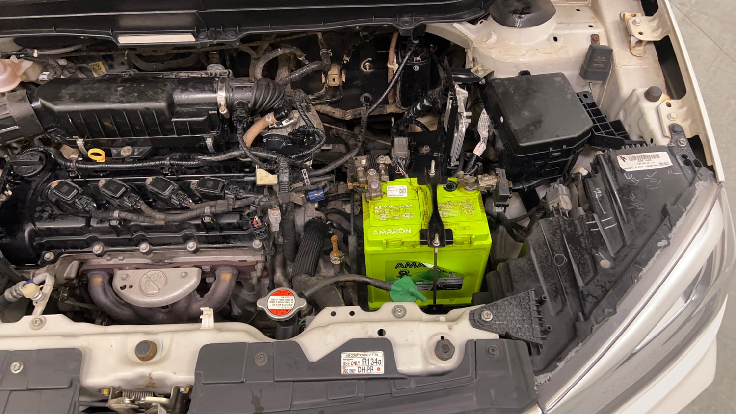 Used 2022 Maruti Suzuki Vitara Brezza VXi AT SHVS Petrol Automatic engine ENGINE LEFT SIDE VIEW