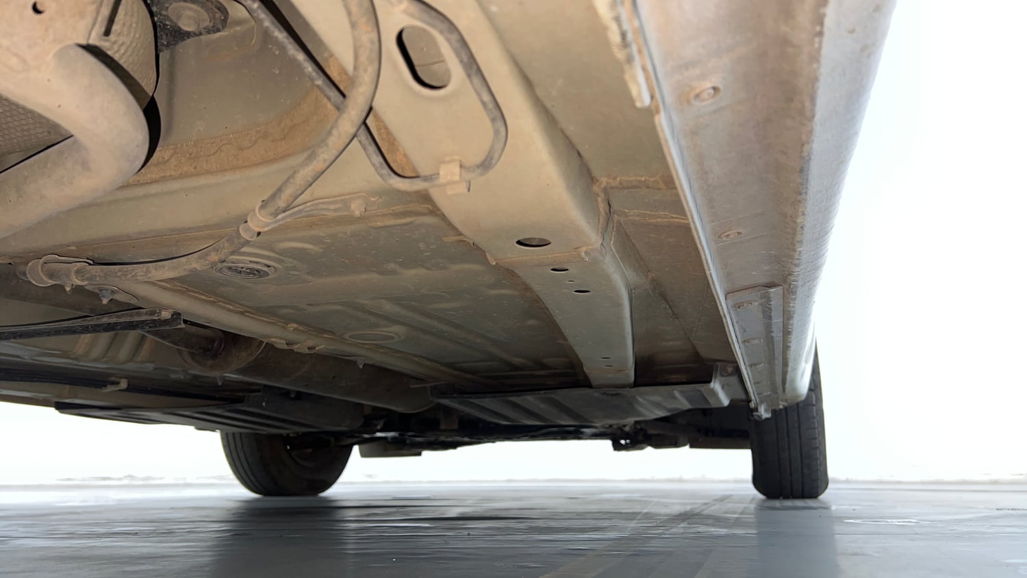 Used 2022 Maruti Suzuki Dzire VXi Petrol Manual extra REAR RIGHT UNDERBODY VIEW