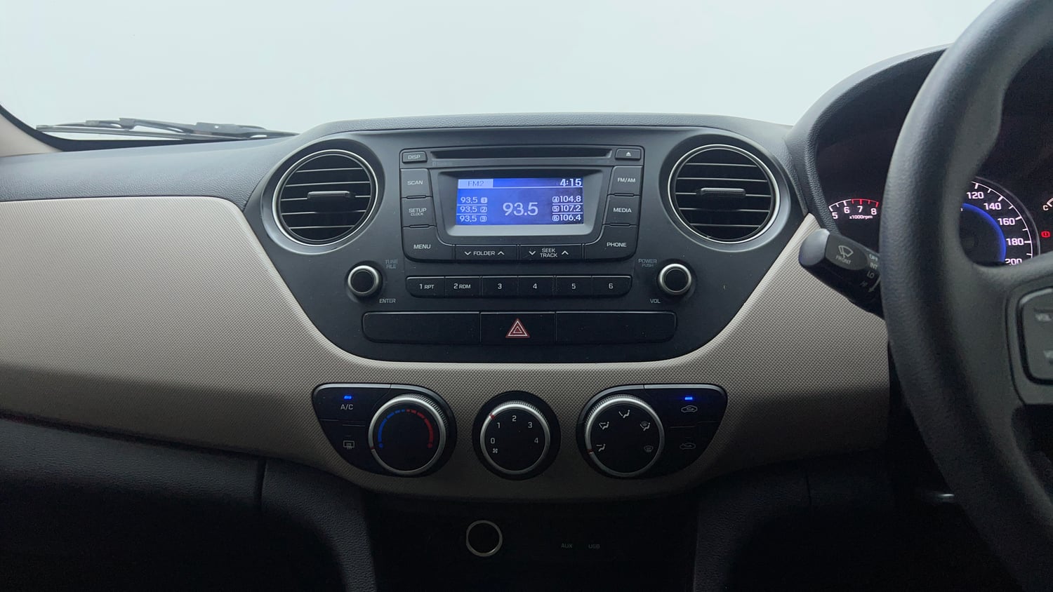 Used 2015 Hyundai Grand i10 Sportz 1.2 Kappa VTVT Petrol Manual interior MUSIC SYSTEM & AC CONTROL VIEW