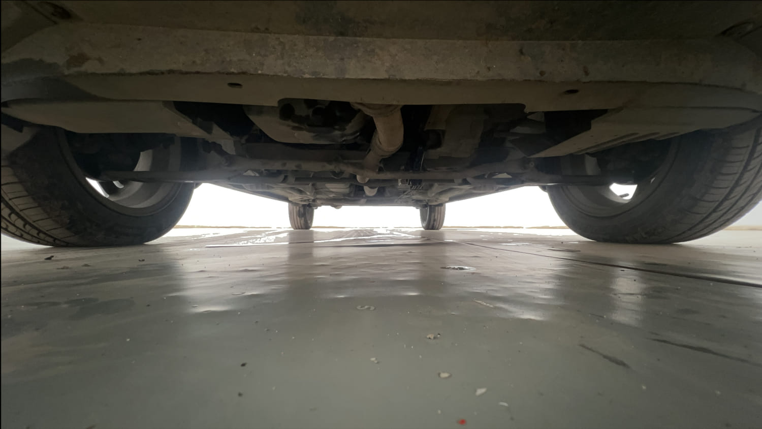 Used 2022 Tata Tigor XZ Plus Petrol Manual extra FRONT LEFT UNDERBODY VIEW