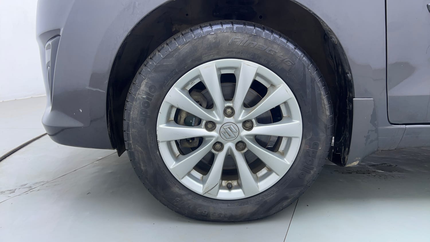 Used 2015 Maruti Suzuki Ertiga ZXi Petrol Manual tyres LEFT FRONT TYRE RIM VIEW