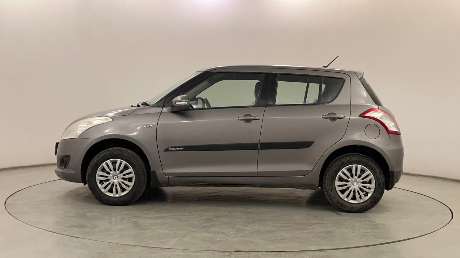 Used 2012 Maruti Suzuki Swift VXi Petrol Manual exterior LEFT SIDE VIEW