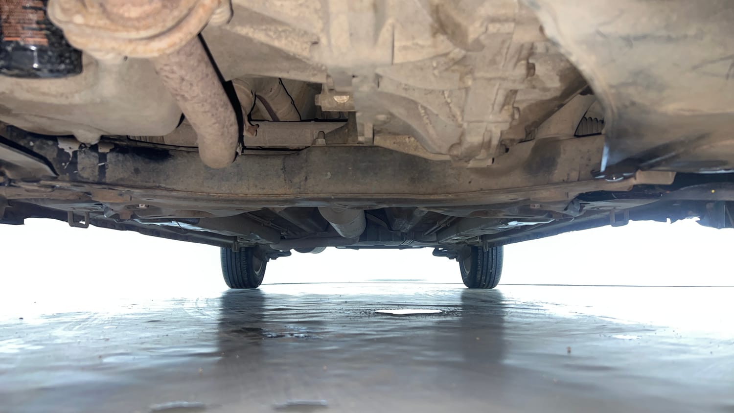 Used 2015 Maruti Suzuki Ertiga ZXi Petrol Manual extra FRONT LEFT UNDERBODY VIEW