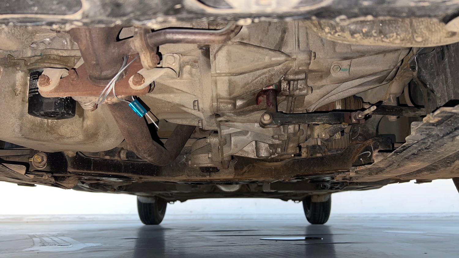 Used 2022 Maruti Suzuki Dzire VXi Petrol Manual extra FRONT LEFT UNDERBODY VIEW