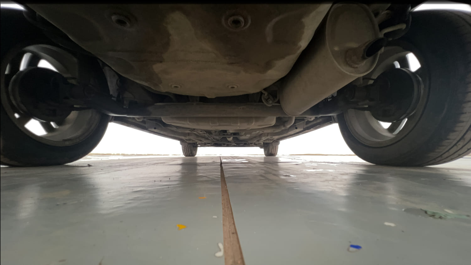 Used 2022 Tata Tigor XZ Plus Petrol Manual extra REAR UNDERBODY VIEW (TAKEN FROM REAR)