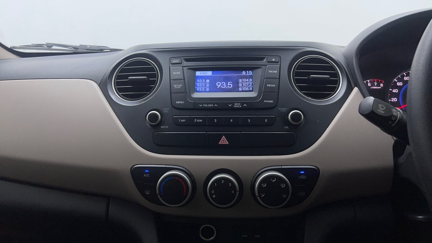 Used 2015 Hyundai Grand i10 Sportz 1.2 Kappa VTVT Petrol Manual top_features Integrated (in-dash) music system