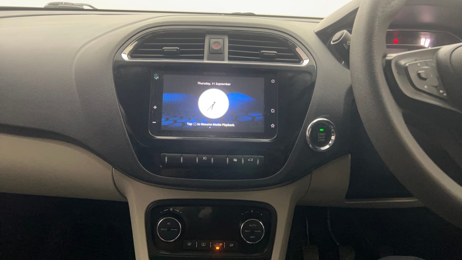 Used 2022 Tata Tigor XZ Plus Petrol Manual top_features Integrated (in-dash) music system