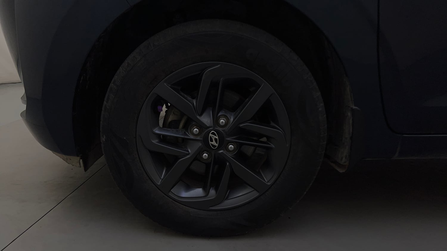 Used 2021 Hyundai Grand i10 Nios Sportz 1.2 Kappa VTVT Petrol Manual tyres LEFT FRONT TYRE RIM VIEW
