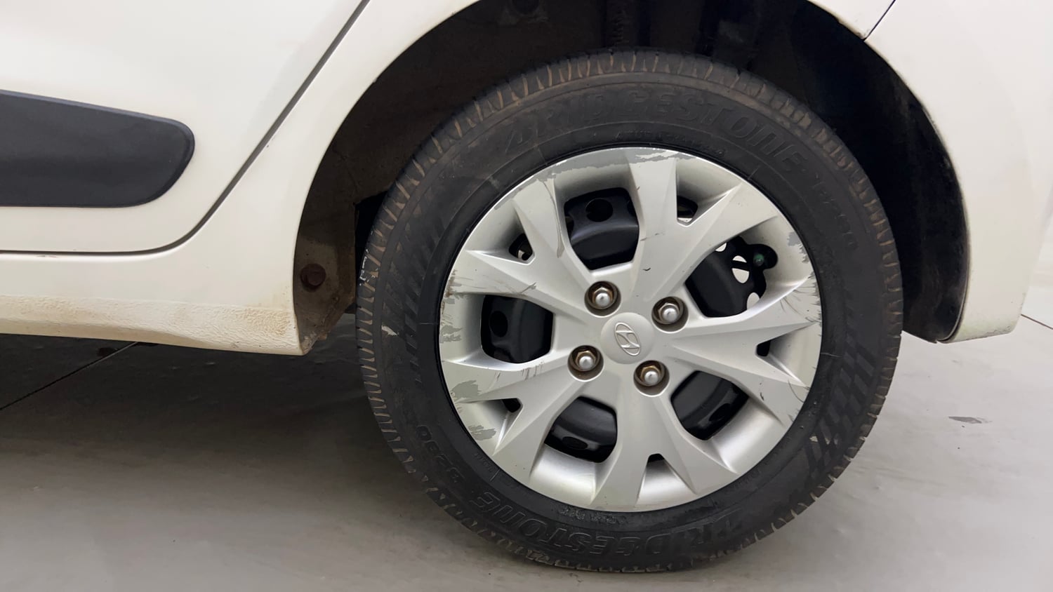 Used 2016 Hyundai Grand i10 Sportz 1.2 Kappa VTVT Petrol Manual tyres LEFT REAR TYRE RIM VIEW