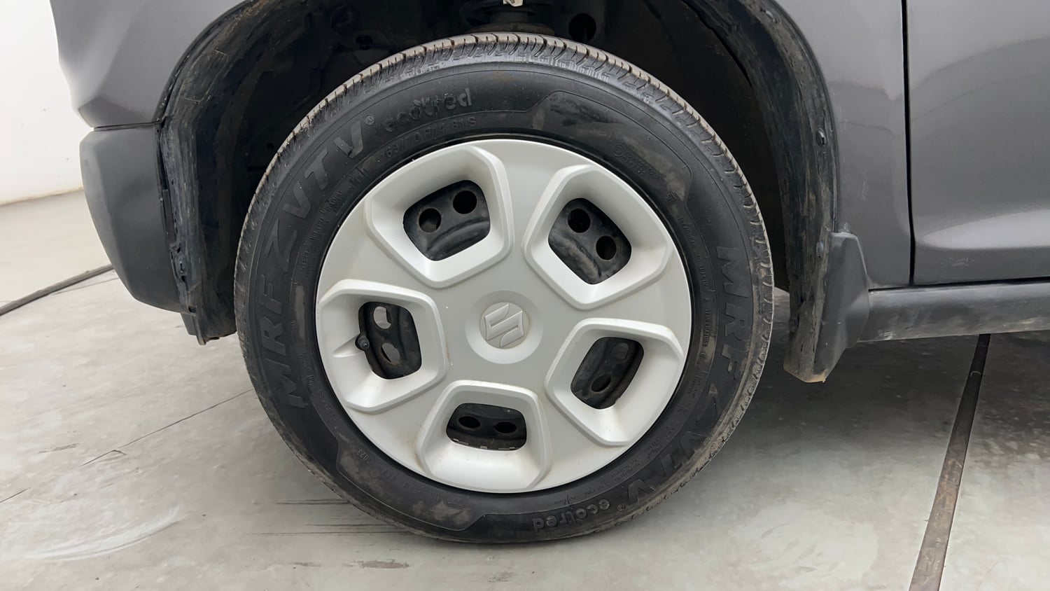 Used 2023 Maruti Suzuki S-Presso VXi (O) AMT Petrol Automatic tyres LEFT FRONT TYRE RIM VIEW
