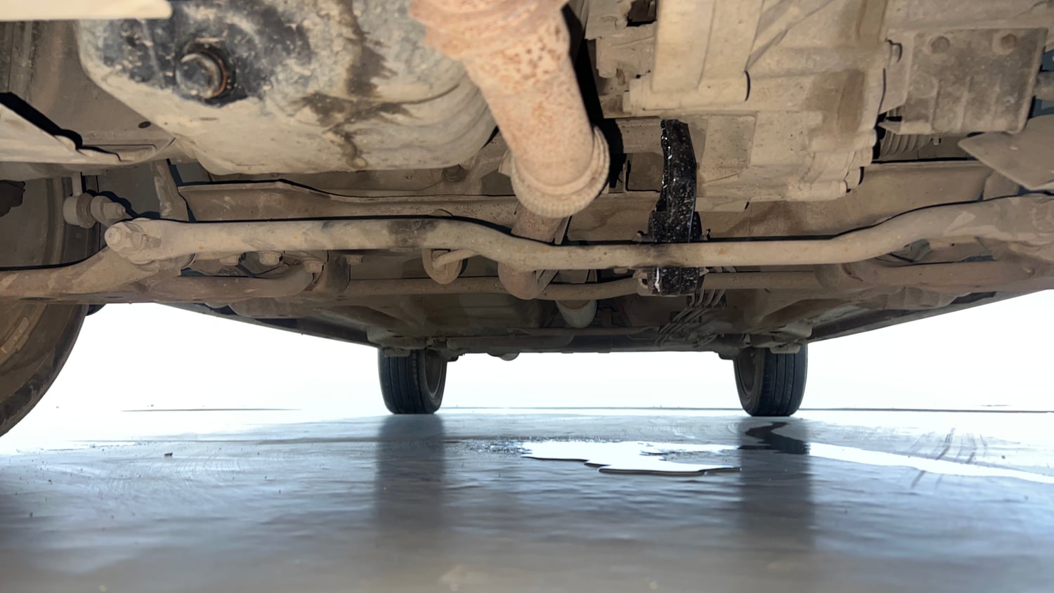 Used 2018 Tata Tigor Revotron XZA Petrol Automatic extra FRONT LEFT UNDERBODY VIEW