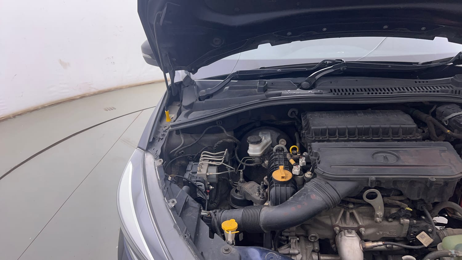 Used 2022 Tata Tigor XZ Plus Petrol Manual engine ENGINE RIGHT SIDE HINGE & APRON VIEW