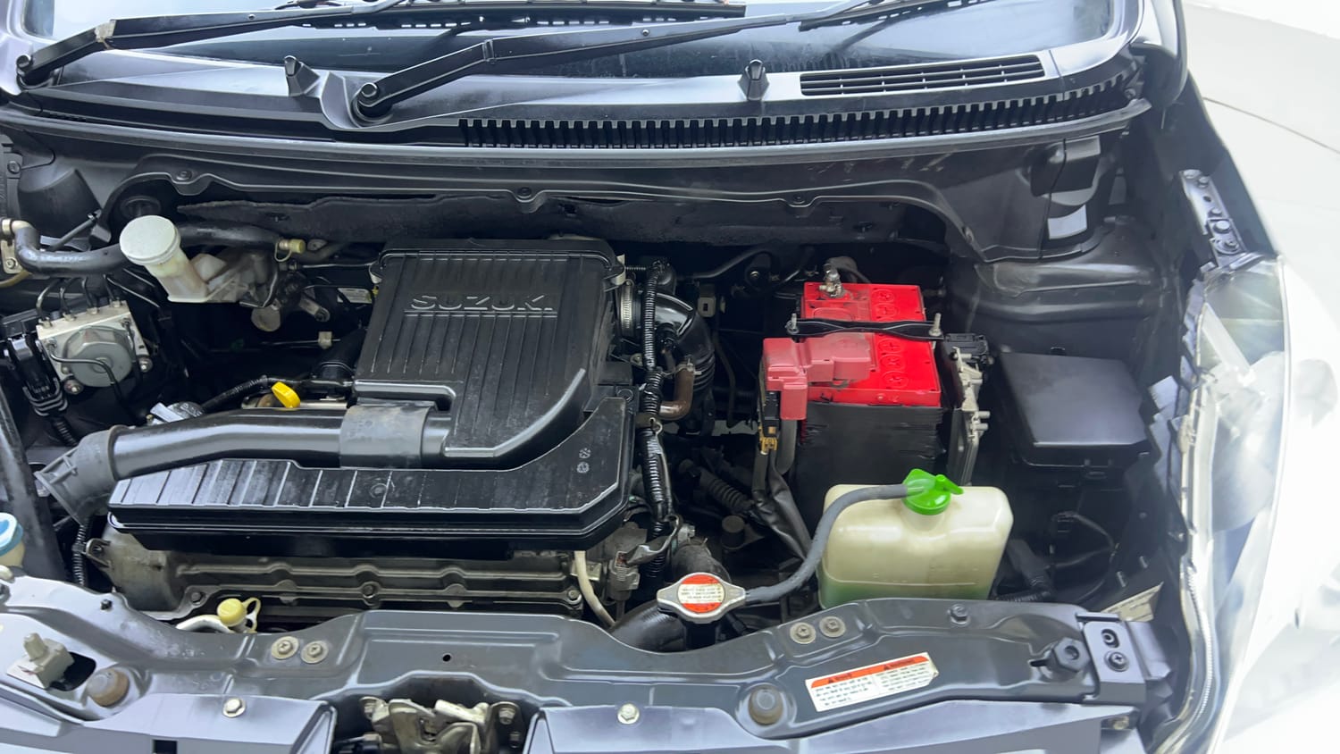 Used 2015 Maruti Suzuki Ertiga ZXi Petrol Manual engine ENGINE LEFT SIDE VIEW