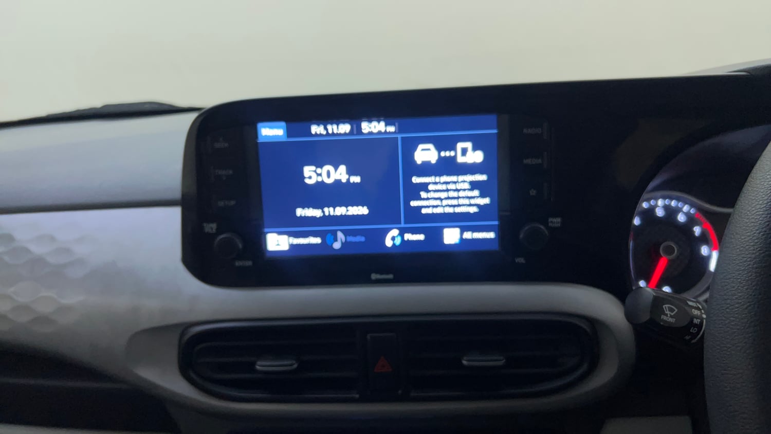 Used 2021 Hyundai Grand i10 Nios Sportz 1.2 Kappa VTVT Petrol Manual top_features Integrated (in-dash) music system