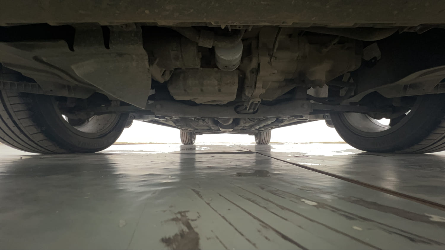 Used 2022 Volkswagen Taigun Topline 1.0 TSI MT Petrol Manual extra FRONT LEFT UNDERBODY VIEW