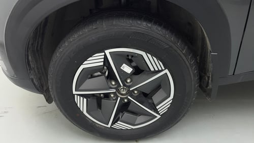 Used 2024 Tata Nexon Creative Plus 1.2 Revotron Petrol 7DCA Petrol Automatic tyres LEFT FRONT TYRE RIM VIEW