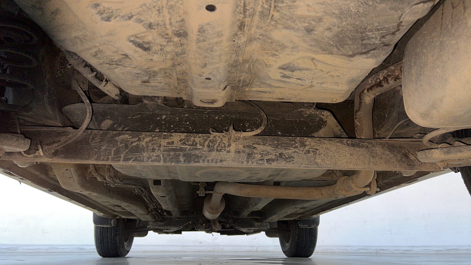 Used 2024 tata Nexon Fearless S 1.2 Revotron Petrol 7DCA Dual Tone Petrol Automatic extra REAR UNDERBODY VIEW (TAKEN FROM REAR)