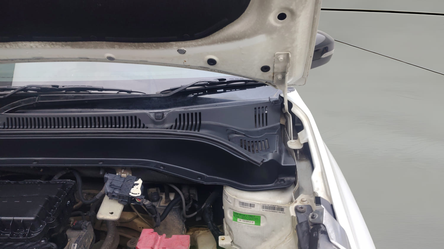 Used 2022 Tata Punch Creative Dual Tone Petrol Manual engine ENGINE LEFT SIDE HINGE & APRON VIEW