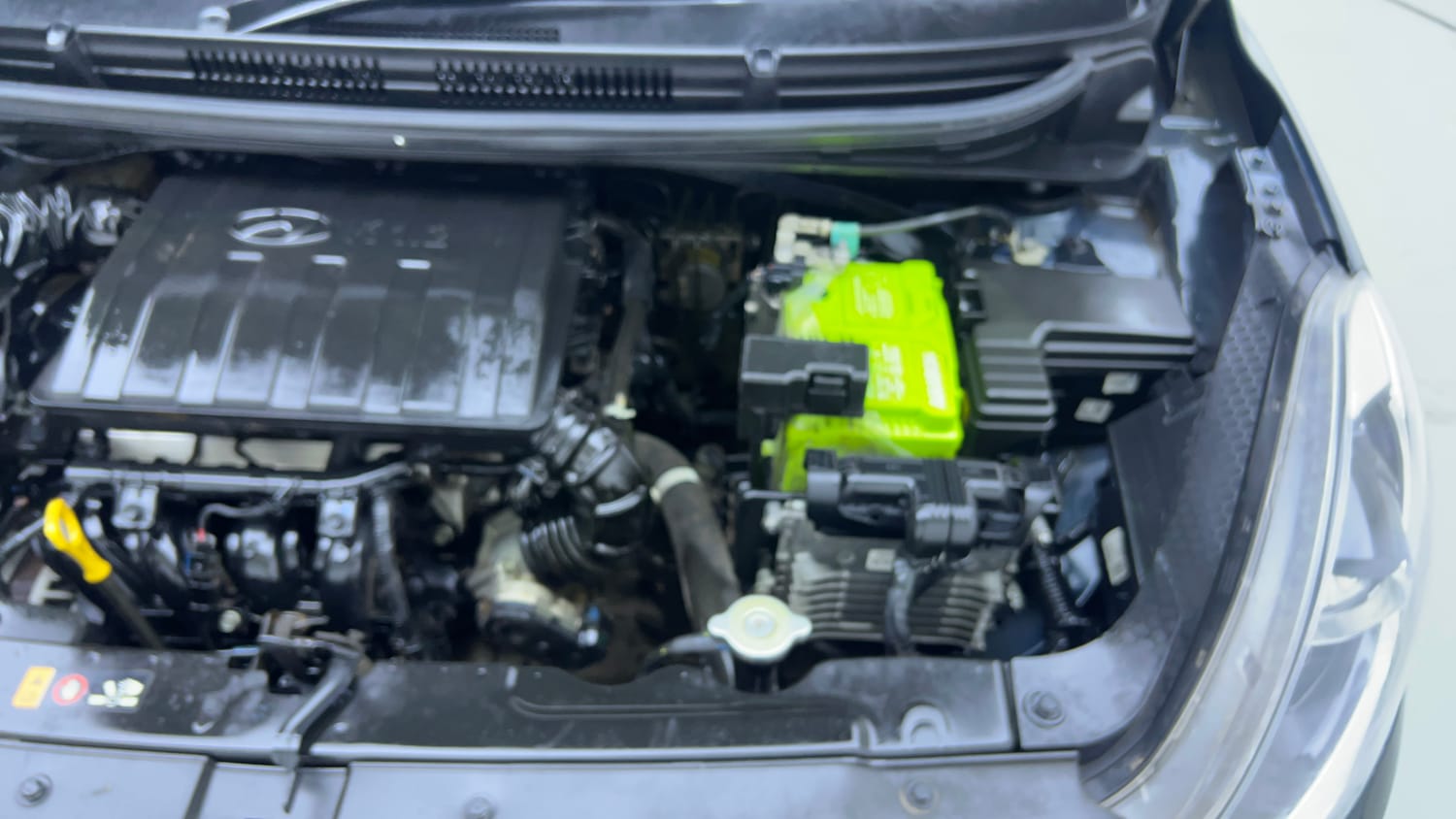 Used 2022 Hyundai Grand i10 Nios Sportz AMT 1.2 Kappa VTVT Petrol Automatic engine ENGINE LEFT SIDE VIEW