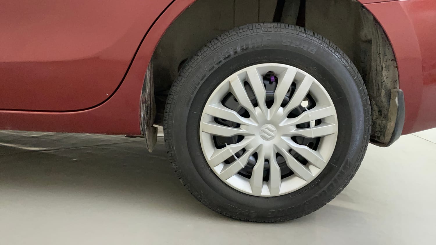 Used 2017 Maruti Suzuki Dzire VXi AMT Petrol Automatic tyres LEFT REAR TYRE RIM VIEW