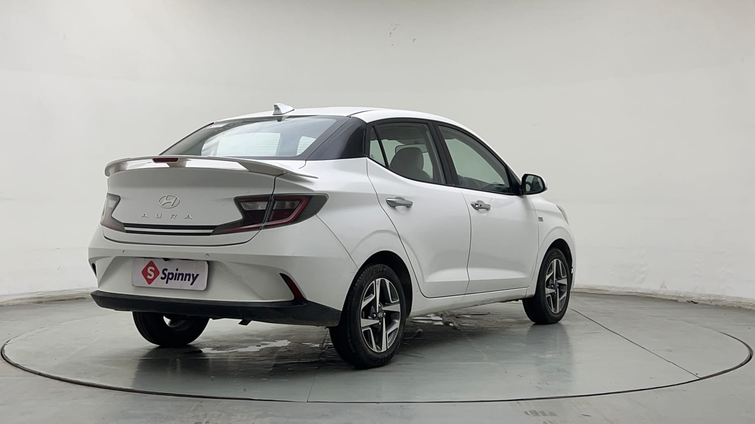 Used 2024 Hyundai Aura SX Plus 1.2 AMT Petrol Petrol Automatic exterior RIGHT REAR CORNER VIEW