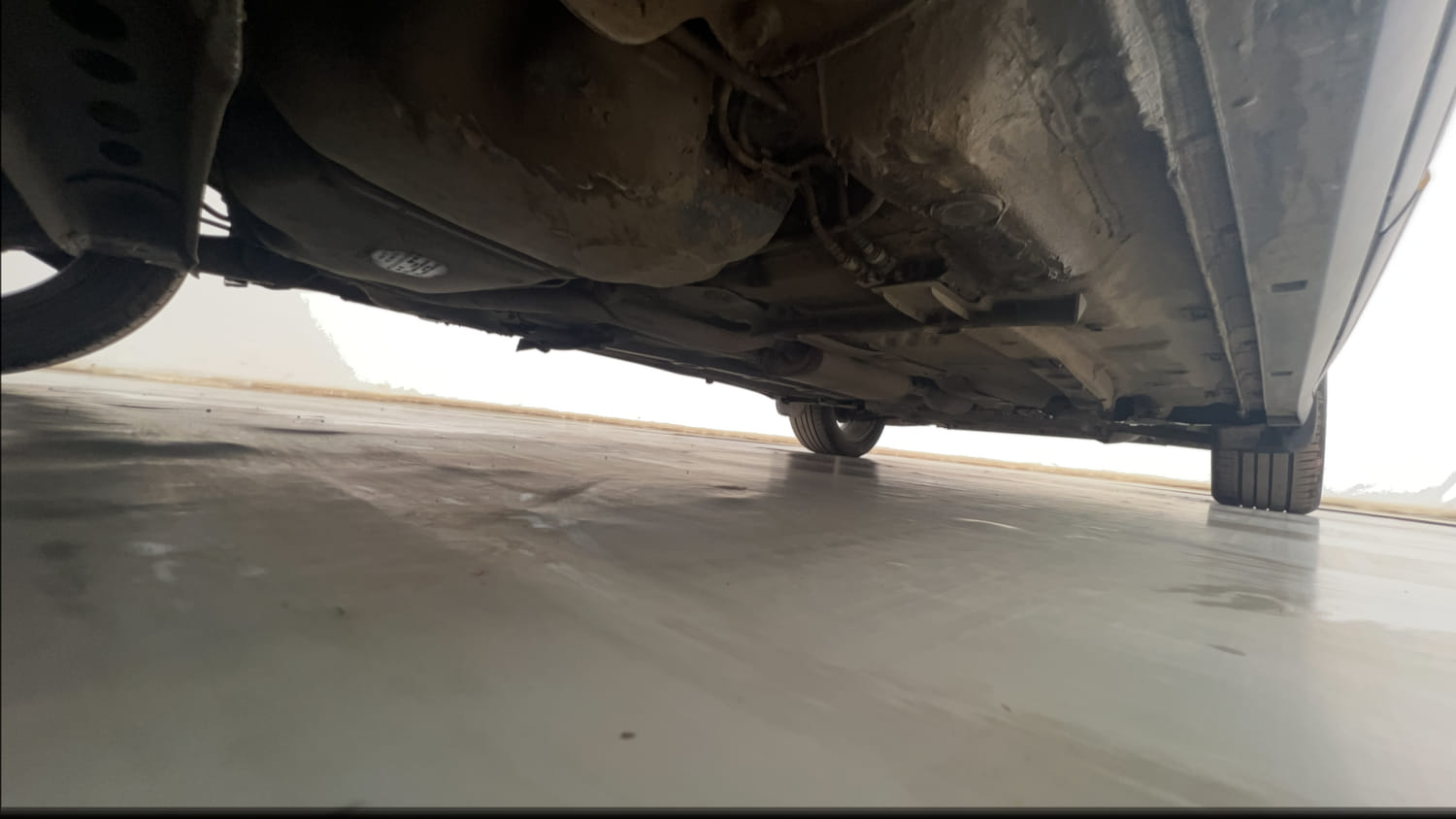 Used 2022 Volkswagen Taigun Topline 1.0 TSI MT Petrol Manual extra REAR RIGHT UNDERBODY VIEW