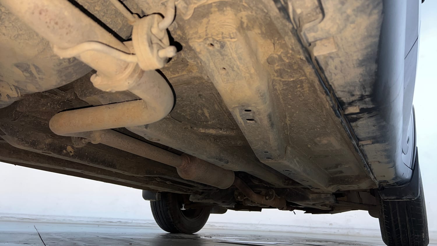 Used 2024 tata Nexon Fearless S 1.2 Revotron Petrol 7DCA Dual Tone Petrol Automatic extra REAR RIGHT UNDERBODY VIEW