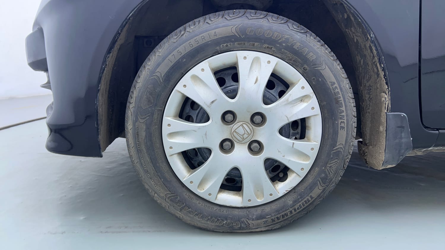 Used 2014 Honda Brio S MT Petrol Manual tyres LEFT FRONT TYRE RIM VIEW